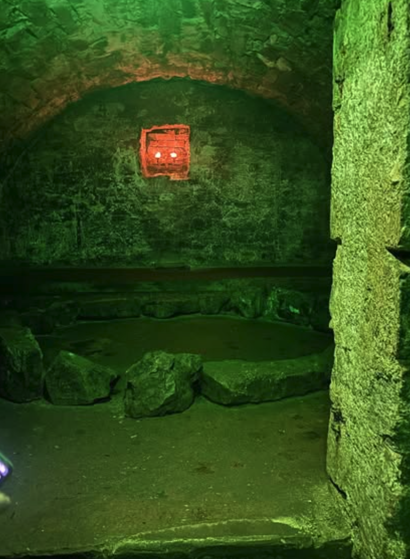 A shadowed vault used on Edinburgh underground ghost tours